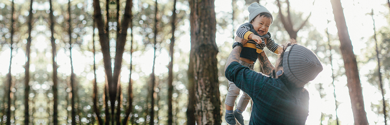 Father and children playing together, image used for HSBC Banking Security page.