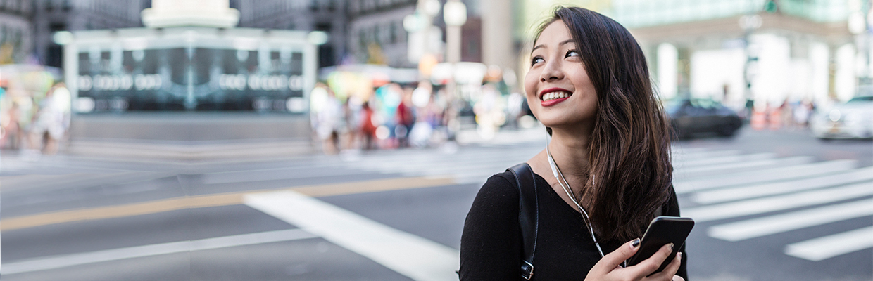 A young woman is preparing to invest; image used for investment risk tolerance page.