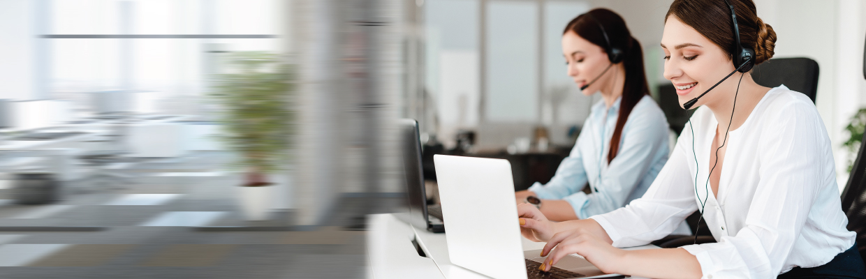 Two customer service officers; Image used for HSBC travel secretary services page.