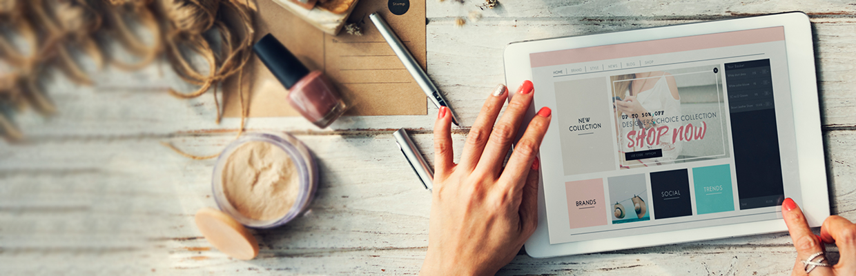 A woman is shopping online with tablet; image used for HSBC Credit Cards page.